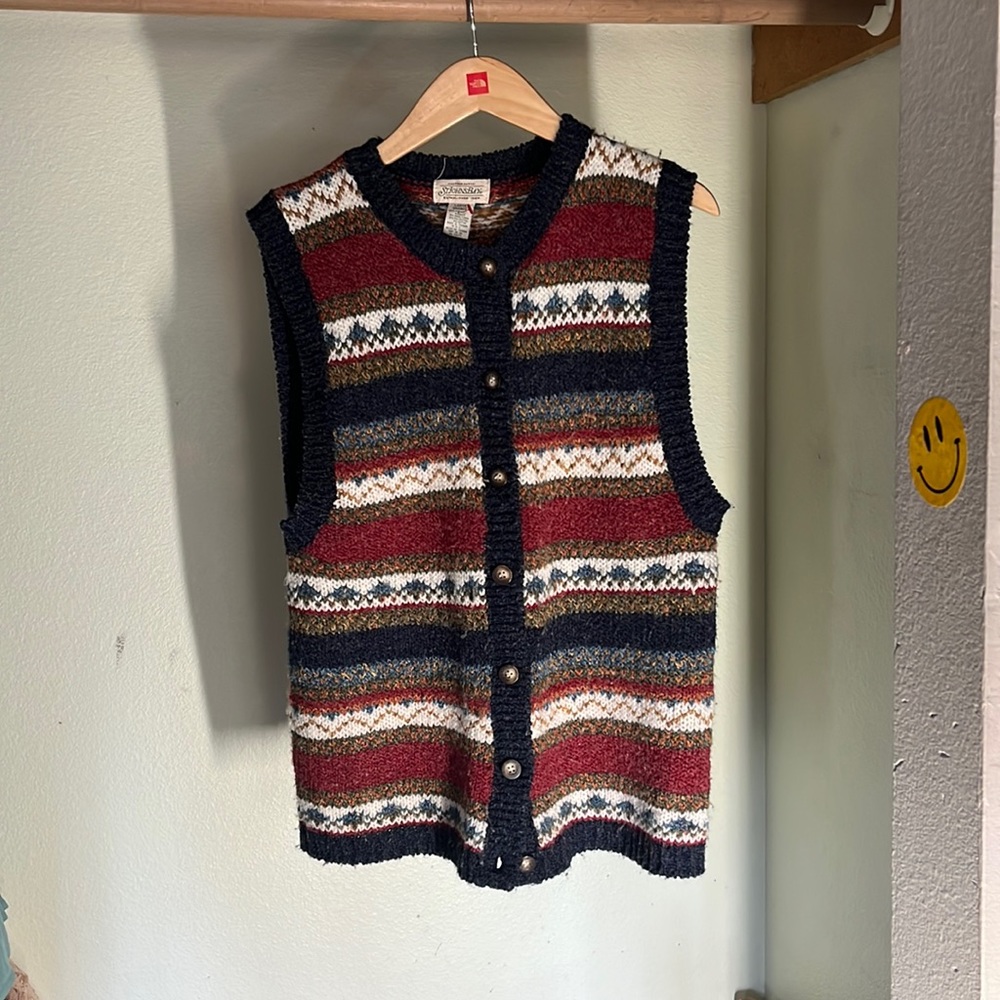 Knit sweater vest.